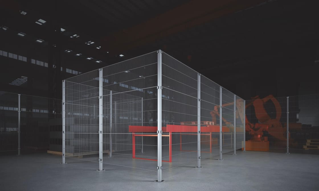 Flex afscherming rondom een industriële robotcel in een productiehal